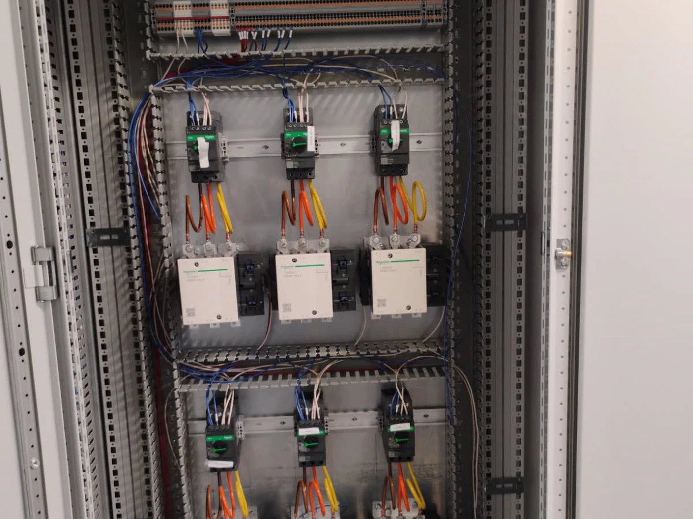 Chapman-built contactor cabinet with copper-lugged conductors and labelled terminations