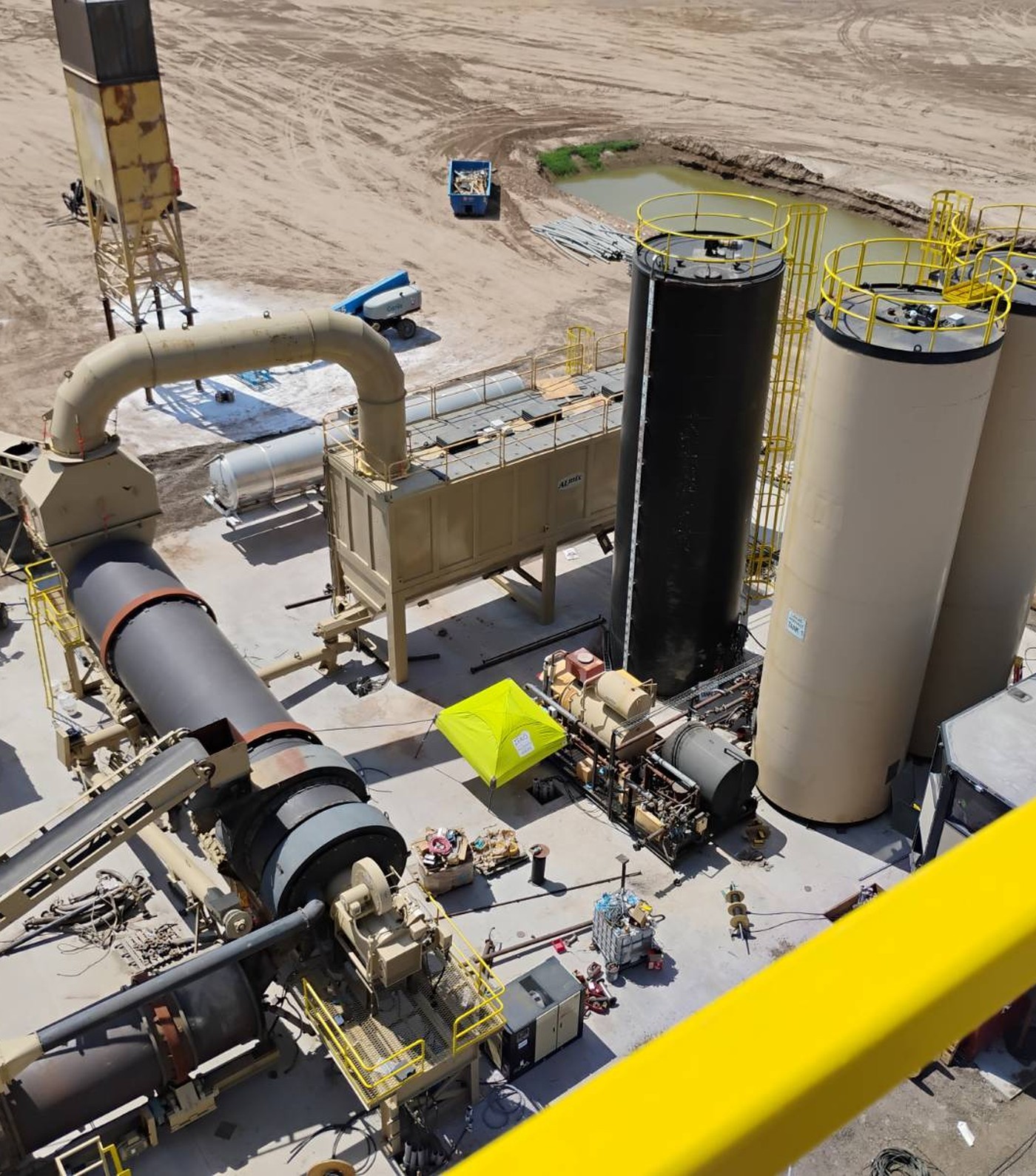 Aerial view of an Arizona asphalt plant powered by Chapman Electric — drum dryer, baghouse, AC tank and silos