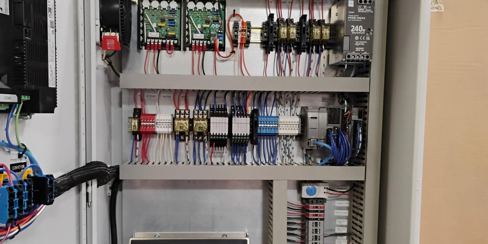 Batching control panel interior built by Chapman Electric, Rice Lake 682 SynergyPlus indicator, PLC and relay logic